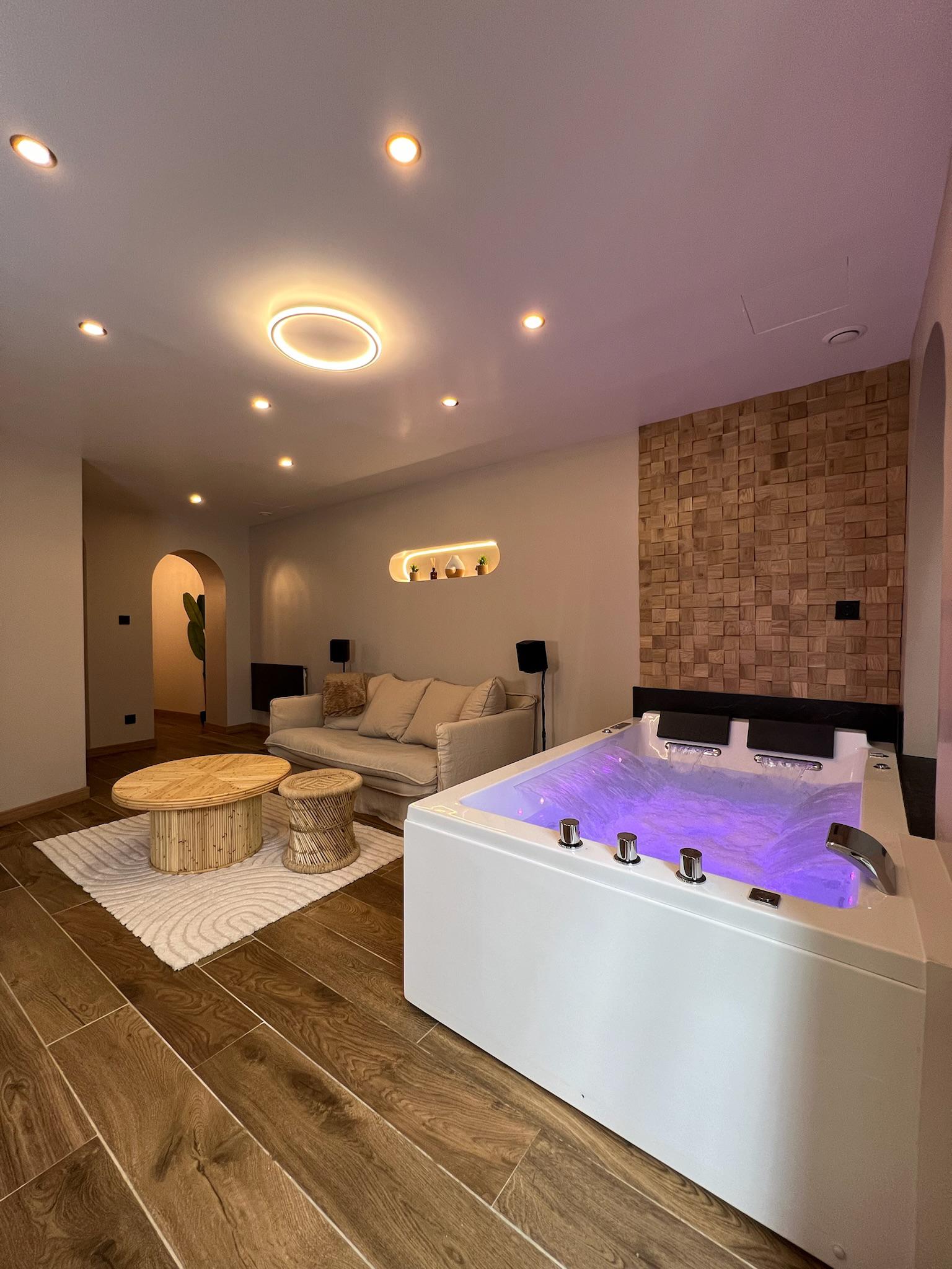 Salon de la Suite RAMOO — suite privative jacuzzi sauna près de Paris